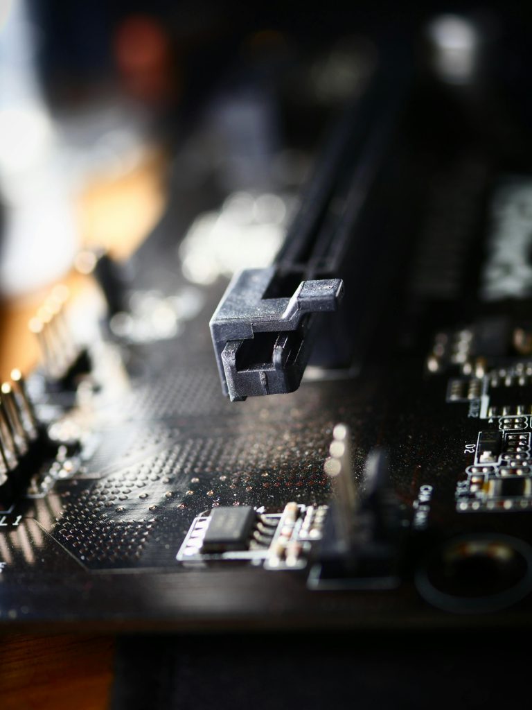 Detailed view of a circuit board showing electronic components and connectors.